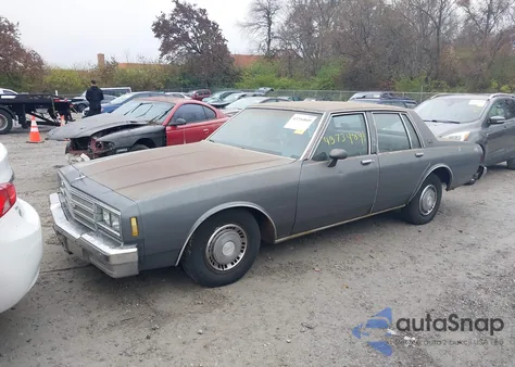1985 Chevrolet Impala z USA, uszkodzony, nr VIN 1G1BL69H4FH134928